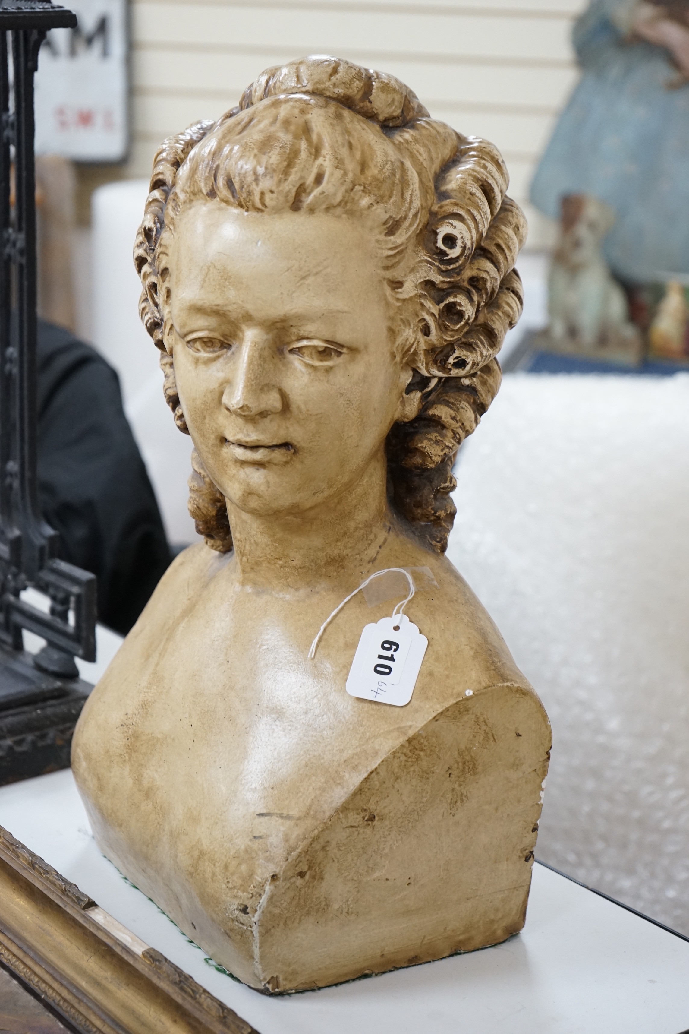 A washed plaster bust of a lady, 50cm tall